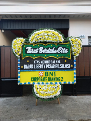 Papan Bunga Duka di Balong