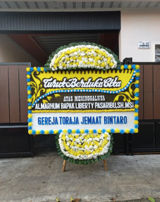 Papan Bunga Duka di Balong
